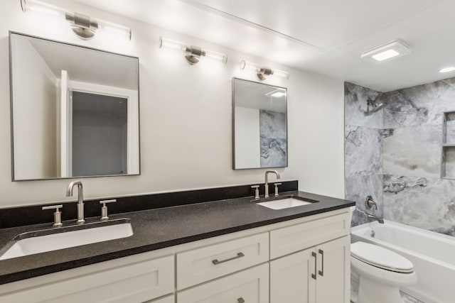7525 Holly Hill Dr Unit 17, Dallas, TX 75231 - bathroom with toilet, double vanity, and shower / washtub combination