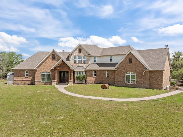 240 Stone Mountain Rd, Cresson, TX 76035 - view of front of house with french doors, a front lawn, a shingled roof, and brick siding