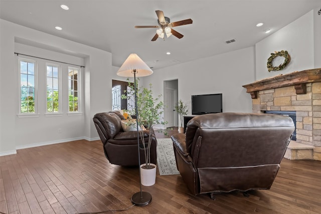 240 Stone Mountain Rd, Cresson, TX 76035 - living room featuring wood finished floors, ceiling fan, baseboards, a stone fireplace, and recessed lighting