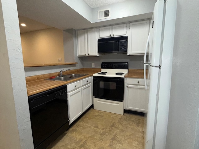 2301 Basil Dr Unit F114, Arlington, TX 76006 - kitchen with black appliances, a sink, white cabinetry, light countertops, and a textured wall