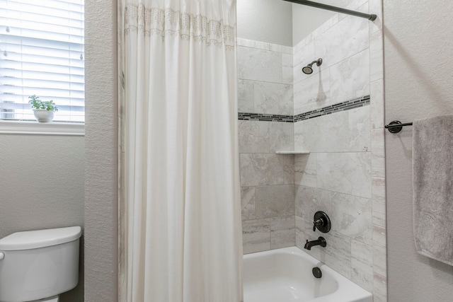 1061 Circle J Trl, Prosper, TX 75078 - bathroom with a textured wall, shower / bath combo with shower curtain, and toilet