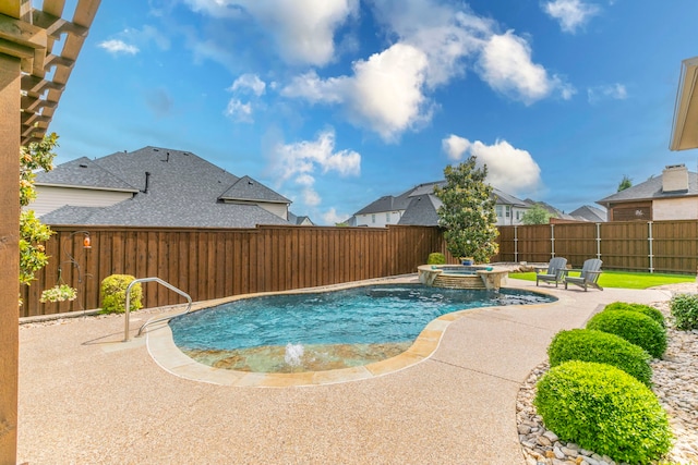 1061 Circle J Trl, Prosper, TX 75078 - view of pool with a patio, a fenced backyard, a pool with connected hot tub, and a residential view