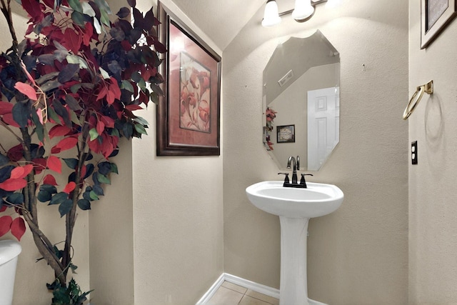 1942 Garrison Way, Garland, TX 75040 - half bath featuring tile patterned flooring and toilet