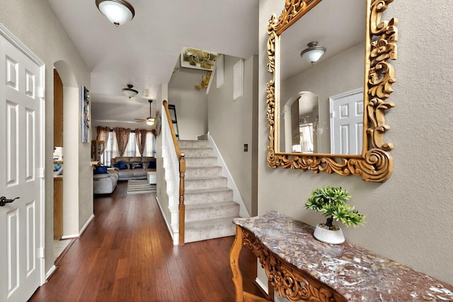 1942 Garrison Way, Garland, TX 75040 - entryway with hardwood / wood-style floors, ceiling fan, and stairway