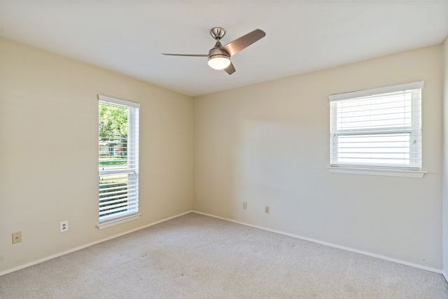 3644 Courtdale Dr, Farmers Branch, TX 75234 - carpeted spare room with a ceiling fan and baseboards