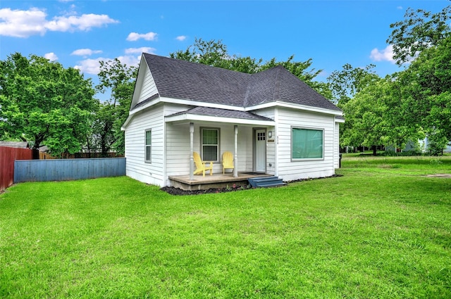 514 W Baker St, Denison, TX 75020 - view of front facade featuring a porch and roof with shingles