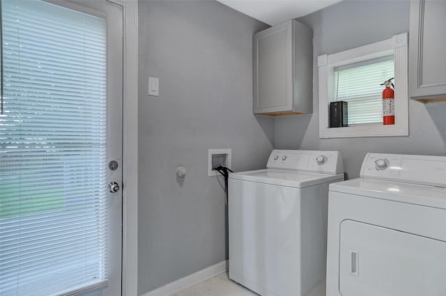 514 W Baker St, Denison, TX 75020 - washroom with cabinet space, washing machine and dryer, and baseboards