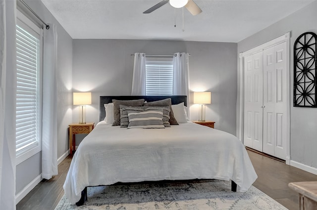 514 W Baker St, Denison, TX 75020 - bedroom with wood finished floors, baseboards, ceiling fan, and a closet