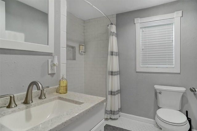 514 W Baker St, Denison, TX 75020 - bathroom featuring toilet, curtained shower, vanity, and tile patterned flooring