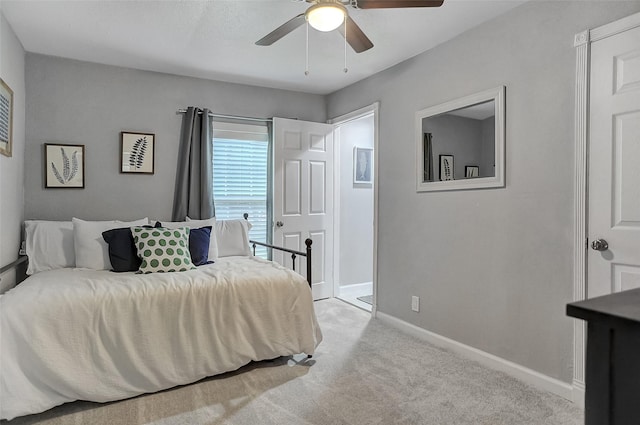 514 W Baker St, Denison, TX 75020 - bedroom featuring carpet, baseboards, and a ceiling fan