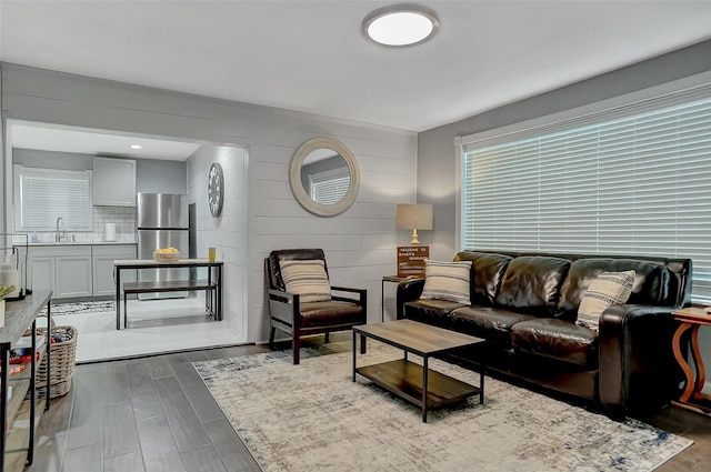 514 W Baker St, Denison, TX 75020 - living area featuring dark wood-style flooring