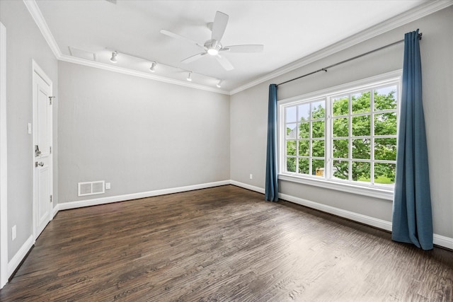 unfurnished room featuring track lighting, wood finished floors, ornamental molding, a ceiling fan, and baseboards