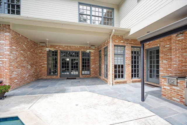 view of patio featuring french doors