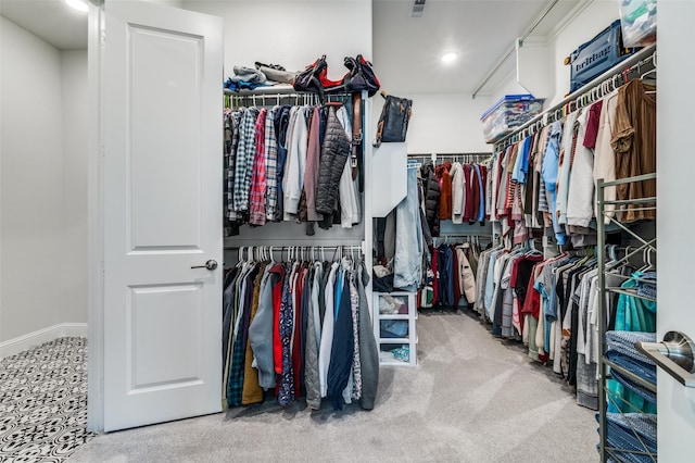 2813 Dorset, The Colony, TX 75056 - walk in closet with carpet flooring