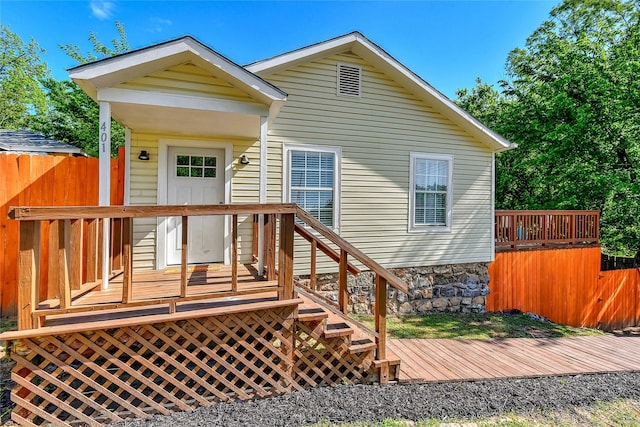 401 W Acheson St, Denison, TX 75020 - rear view of property with a deck and fence