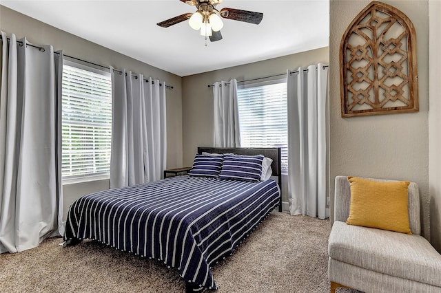 401 W Acheson St, Denison, TX 75020 - carpeted bedroom with multiple windows and ceiling fan