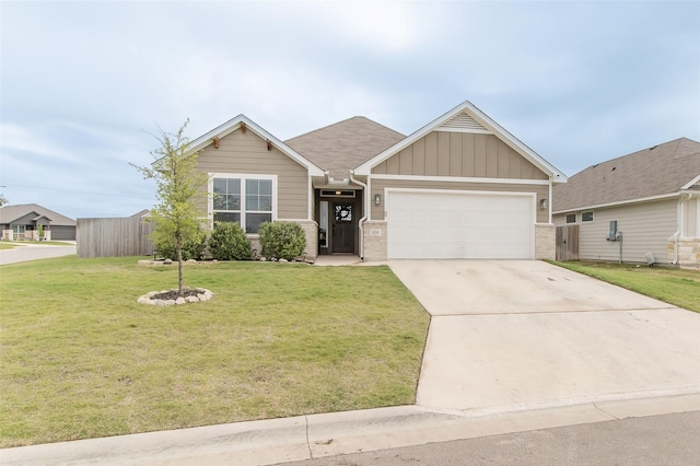 816 Killam Dr, Temple, TX 76502 - view of front of house with a garage, concrete driveway, board and batten siding, and brick siding