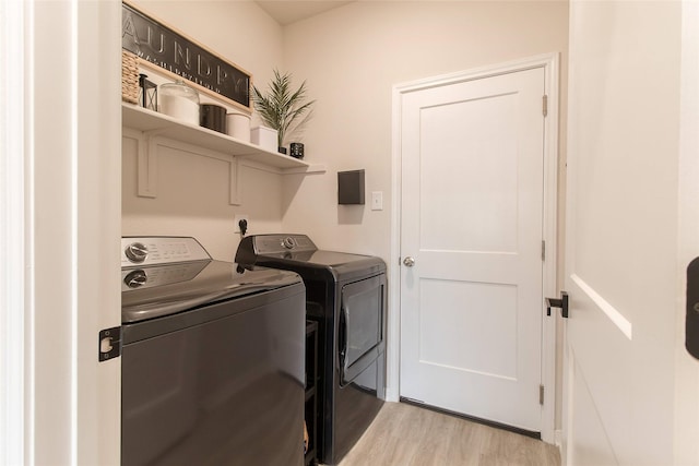 816 Killam Dr, Temple, TX 76502 - clothes washing area with washer and dryer and light wood-type flooring