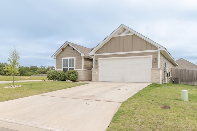 816 Killam Dr, Temple, TX 76502 - view of front facade featuring brick siding, a garage, driveway, and central air condition unit
