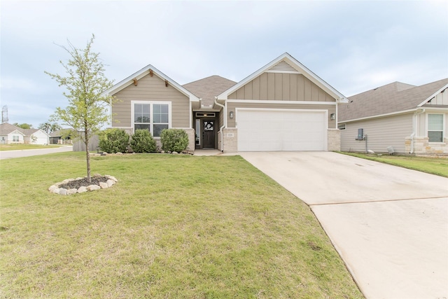 816 Killam Dr, Temple, TX 76502 - view of front of property featuring board and batten siding, an attached garage, concrete driveway, a front lawn, and brick siding