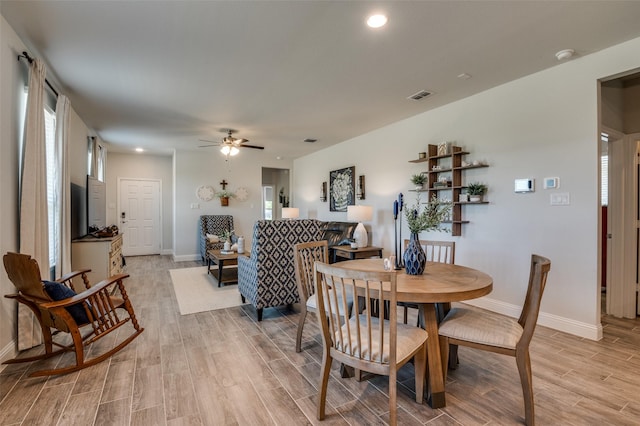 dining area with light wood finished floors, baseboards, ceiling fan, and recessed lighting