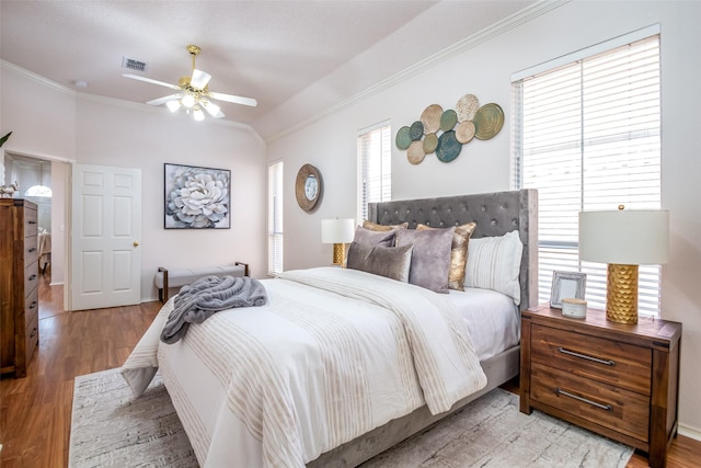 3104 Ridge Hollow Dr, Plano, TX 75023 - bedroom with crown molding, wood finished floors, and ceiling fan