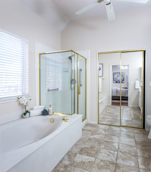 3104 Ridge Hollow Dr, Plano, TX 75023 - bathroom featuring ensuite bath, a garden tub, ceiling fan, a shower stall, and lofted ceiling