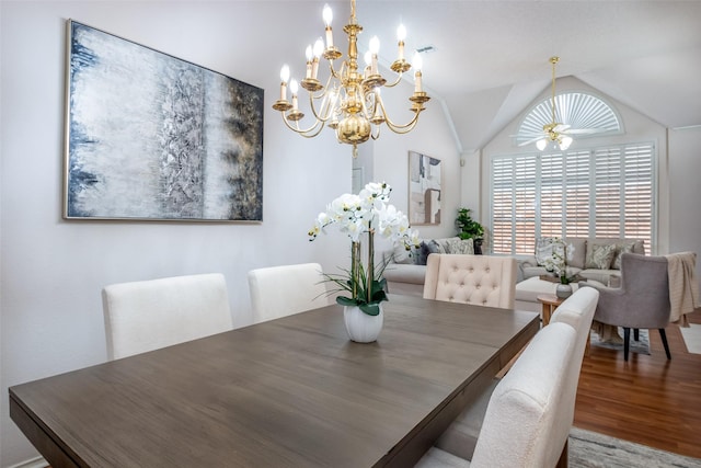 3104 Ridge Hollow Dr, Plano, TX 75023 - dining area with a chandelier, wood finished floors, and vaulted ceiling