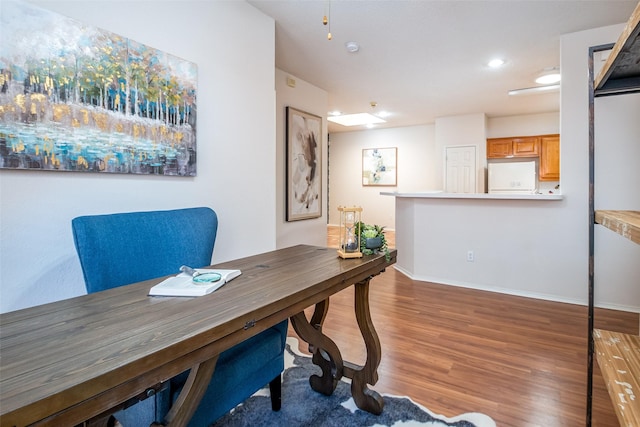 3104 Ridge Hollow Dr, Plano, TX 75023 - office with wood finished floors, baseboards, and recessed lighting