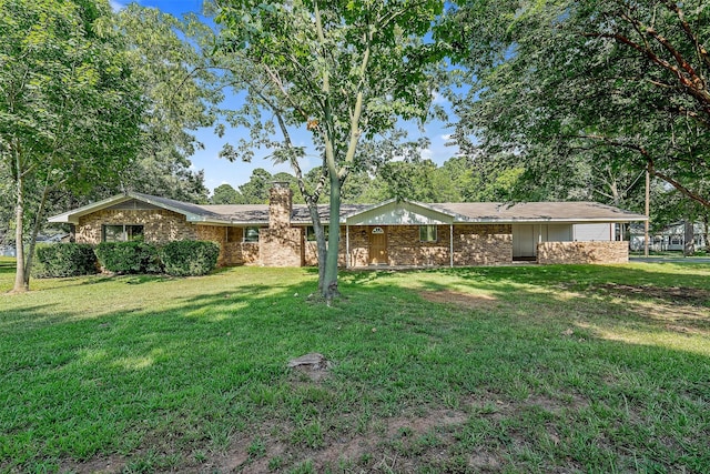 1621 Baseball Loop, Diana, TX 75640 - single story home with a chimney, a front lawn, and brick siding