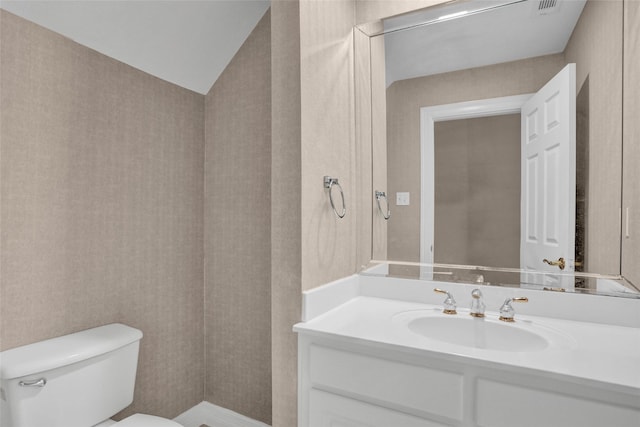 half bath with toilet and vanity