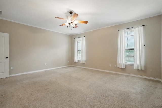 146 Country Oaks Rd, Clyde, TX 79510 - empty room featuring plenty of natural light, ceiling fan, ornamental molding, baseboards, and light carpet