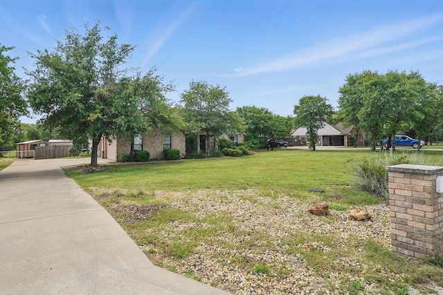 146 Country Oaks Rd, Clyde, TX 79510 - view of green lawn featuring driveway