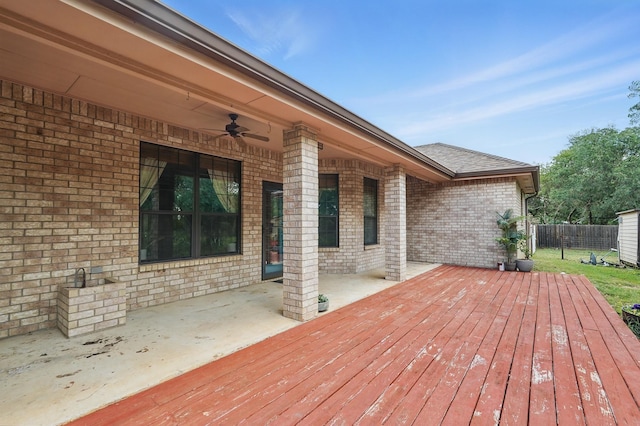 146 Country Oaks Rd, Clyde, TX 79510 - wooden deck with a ceiling fan, a patio, and fence