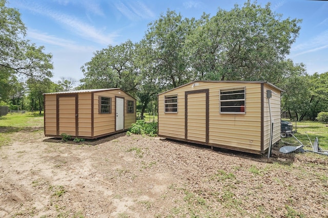 146 Country Oaks Rd, Clyde, TX 79510 - view of shed with view of scattered trees
