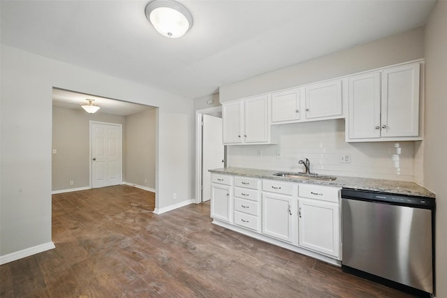 2906 W Parnell St, Denison, TX 75020 - kitchen featuring dishwasher, a sink, tasteful backsplash, and white cabinets