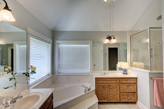 2116 Landau Ln, Bossier City, LA 71111 - full bathroom with a garden tub, vaulted ceiling, tile patterned flooring, a stall shower, and two vanities