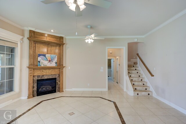 2116 Landau Ln, Bossier City, LA 71111 - unfurnished living room with a ceiling fan, light tile patterned floors, crown molding, a high end fireplace, and baseboards