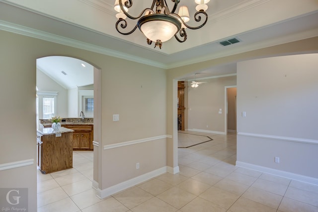 2116 Landau Ln, Bossier City, LA 71111 - empty room with arched walkways, light tile patterned floors, a chandelier, ornamental molding, and a sink