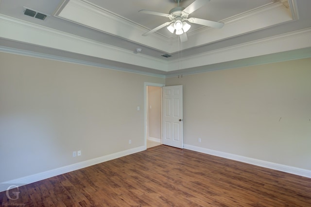 2116 Landau Ln, Bossier City, LA 71111 - empty room featuring a raised ceiling, a ceiling fan, wood finished floors, crown molding, and baseboards