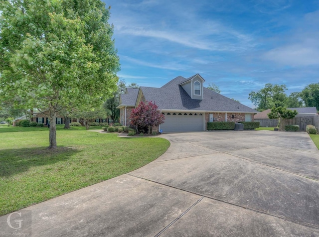 2116 Landau Ln, Bossier City, LA 71111 - view of front of property with concrete driveway, an attached garage, brick siding, and roof with shingles