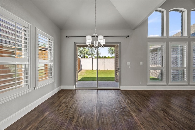 403 Conifer Ln, Allen, TX 75013 - unfurnished dining area featuring vaulted ceiling, a chandelier, baseboards, and dark wood-type flooring