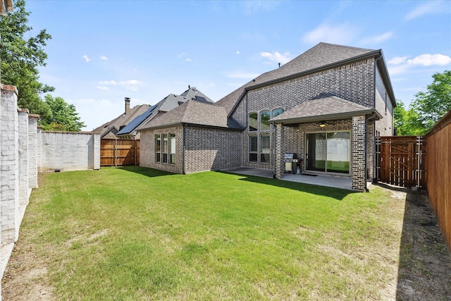 403 Conifer Ln, Allen, TX 75013 - rear view of house featuring brick siding, a patio, and roof with shingles
