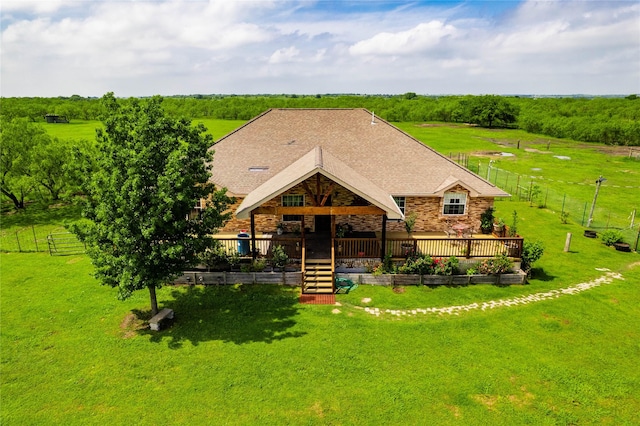 18270 County Road 4160, Frost, TX 76641 - back of property featuring a deck, stone siding, roof with shingles, and stairway