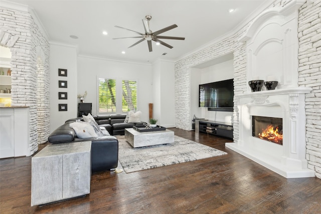 1104 Windsor Dr, Mckinney, TX 75072 - living room featuring a glass covered fireplace, ceiling fan, wood finished floors, ornamental molding, and recessed lighting