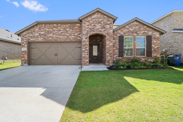 3934 Faulkner Ave, Celina, TX 76227 - view of front of house featuring brick siding, concrete driveway, a front yard, and a garage