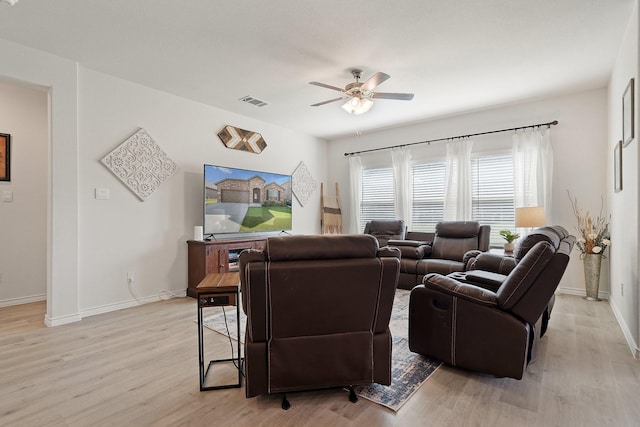 3934 Faulkner Ave, Celina, TX 76227 - living room with ceiling fan, light wood-style floors, and baseboards