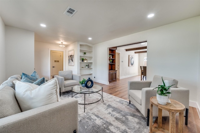 2810 Sunny Hill Ln, Farmers Branch, TX 75234 - living area with light wood-style flooring and recessed lighting
