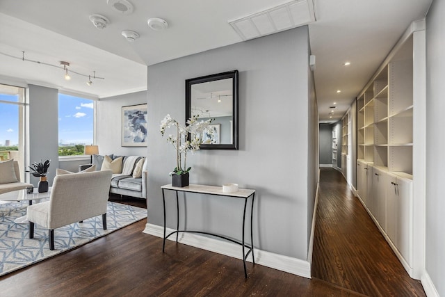 6211 W NW Unit 701, Dallas, TX 75225 - corridor with track lighting, wood finished floors, baseboards, and recessed lighting