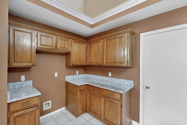 208 Lydia Cir, Irving, TX 75060 - kitchen featuring light tile patterned floors, baseboards, brown cabinets, ornamental molding, and light stone counters